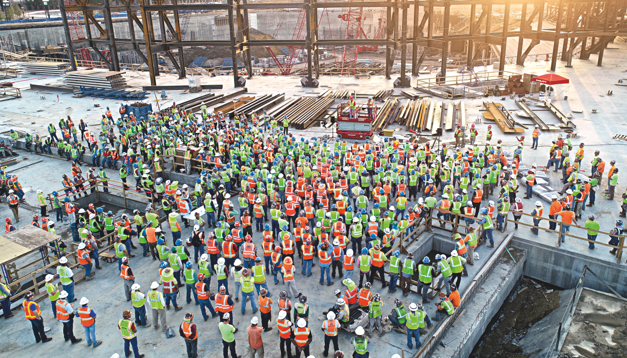 Bild mit Baustelle und Arbeiterversammlung darauf